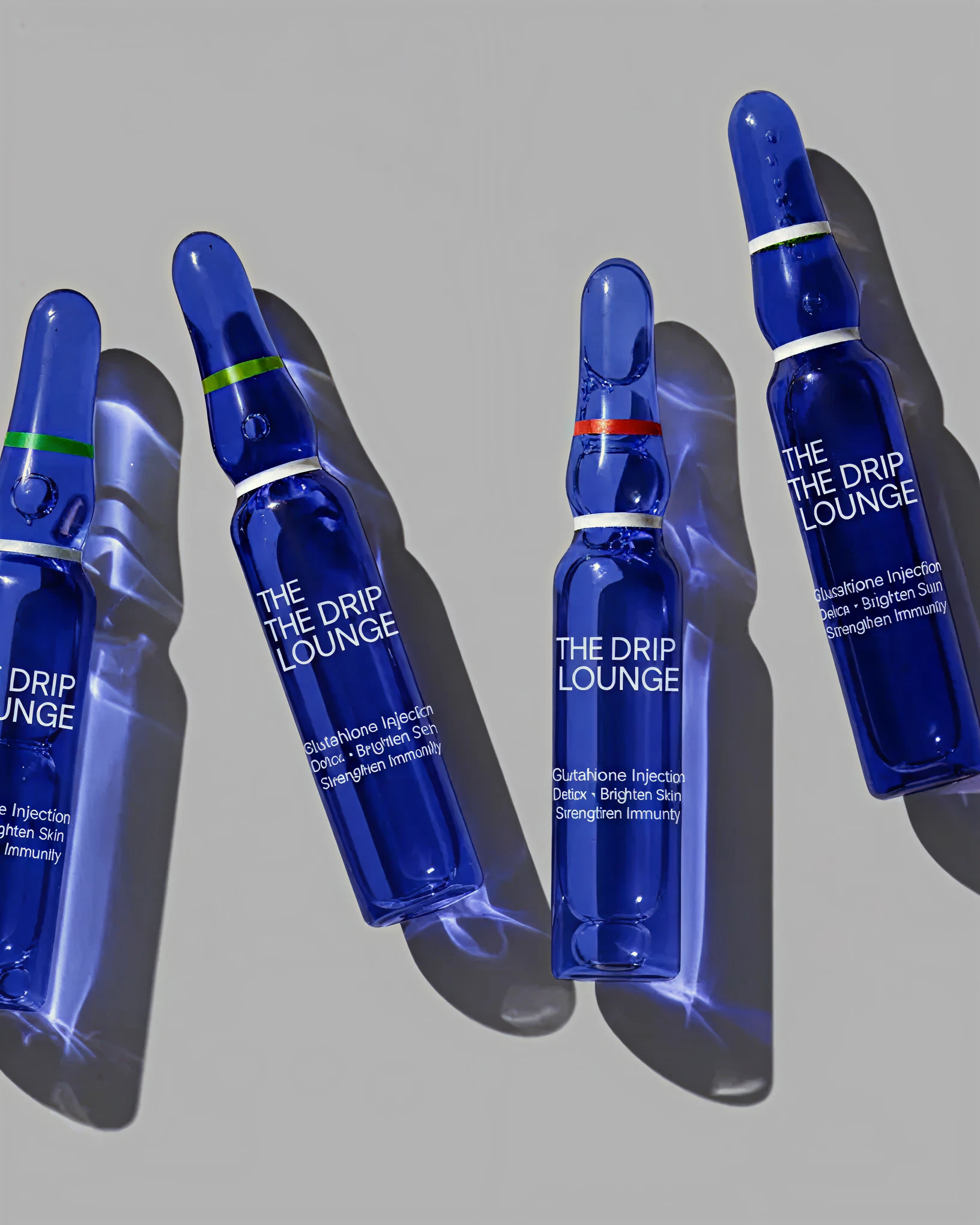 NY Drip Lounge branded wellness products in grayscale